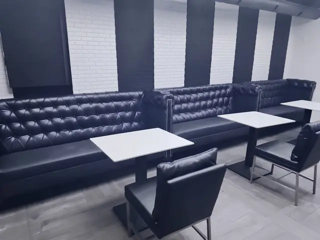 Lounge renovation, after: tufted banquette dining